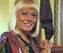 Wendy Richard modeling a Diane Freis dress, 1992