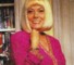 Wendy Richard modeling a Frank Usher dress, 1992