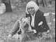 Wendy Richard and her dog pose in a pastoral setting in Regents Park.