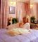 Elegant Wendy Richard lounging at home