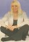 Wendy Richard sitting cross-legged on floor, from 1996 fashion shoot, 
				cover of 'Woman' magazine, 1997