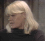 Wendy Richard as Pauline in dark turtleneck