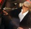 Wendy Richard sitting in a car, with pen in hand, circa late 1980s.