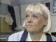 Wendy Richard as Pauline sitting in laundrette