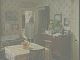 We see a wide shot of Pauline, still wearing her overcoat, standing the doorway between her kitchen and living room, on the set of "EastEnders"