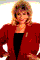 stylish Wendy Richard in red