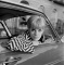 Wendy Richard poses in the driver's seat, 1965.