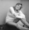Wendy relaxing in high suede boots and short shorts.