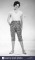 Wendy Richard modeling leopard-spot capri pants.