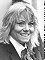 Black-and-white closeup of Wendy Richard, smiling and outdoors