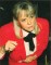 Wendy Richard, circa 1989, arriving at a stylish evening event