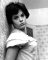 Wendy with short brown hair; possibly shot at home around 1960