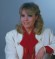 Wendy Richard photoshoot portrait, in red blouse.  Early 1986.