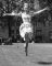 Wendy Richard taking a leap (close-up), London