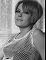 Wendy Richard reclining on a table