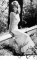Wendy Richard in 1974, sitting on a guardrail in a north London park