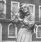 Wendy Richard on a play swing, Argyll Square, London, circa 1973